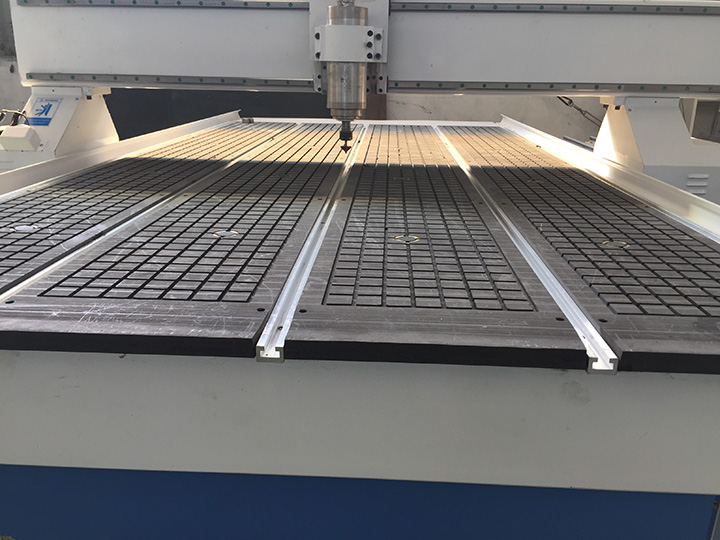 旋轉(zhuǎn)數(shù)控雕刻機(jī)的真空和 T 型槽工作臺(tái) 旋轉(zhuǎn)數(shù)控雕刻機(jī)的真空和 T 型槽工作臺(tái)